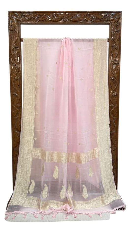 Light pink saree with gold zari border, tassel edge and small paisley motifs