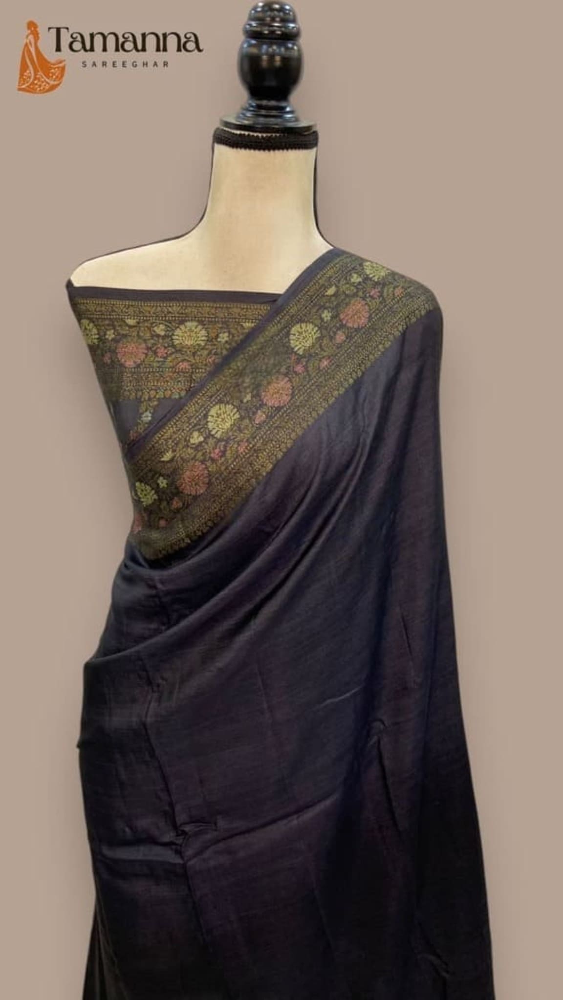 Black plain crepe Banarasi saree with broad dark-gold and green zari border