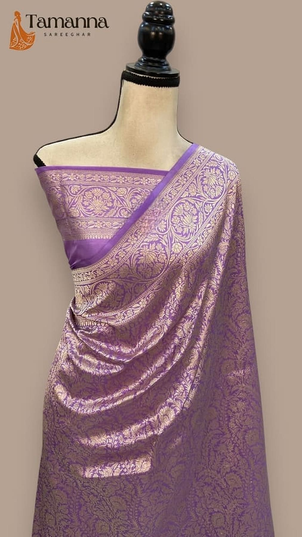 Violet Banarasi silk saree with gold-tone zari border and ornate woven motifs