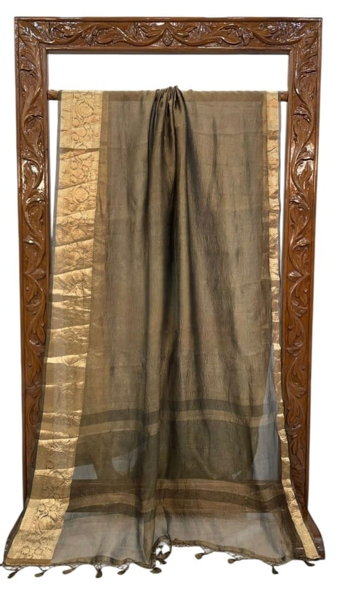Olive saree with gold patterned borders and sheer body, dark stripe accents, tassels