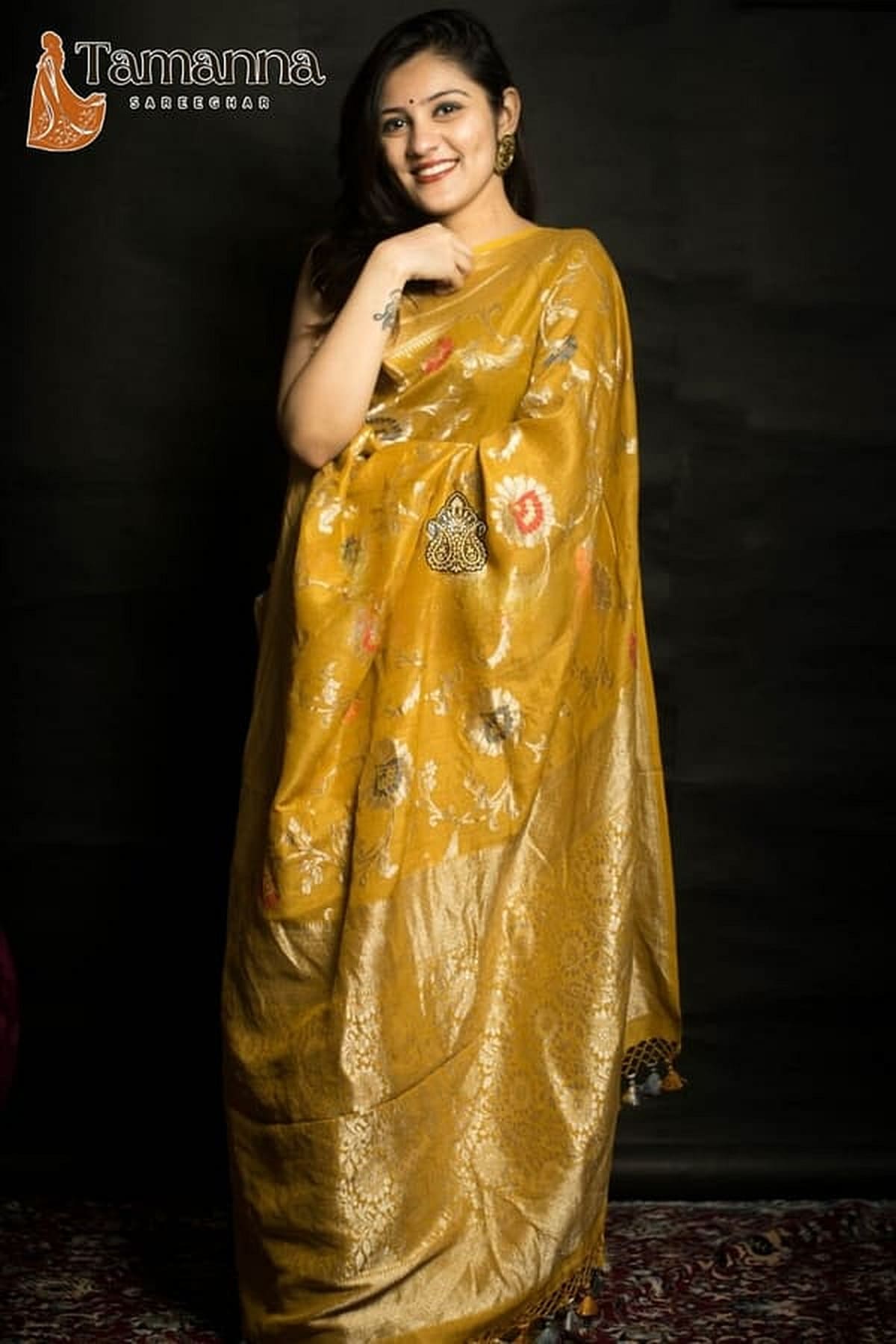 Mustard Banarasi handloom saree with all-over jaal and meena motifs, golden pallu and border