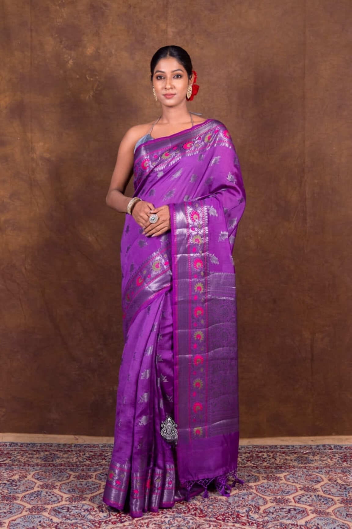 Purple chanderi silk saree with magenta border and gold motifs on the center panel