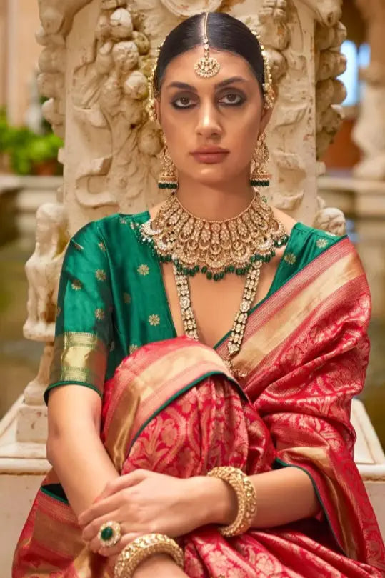 women wear red chinia silk banarasi saree with green border
