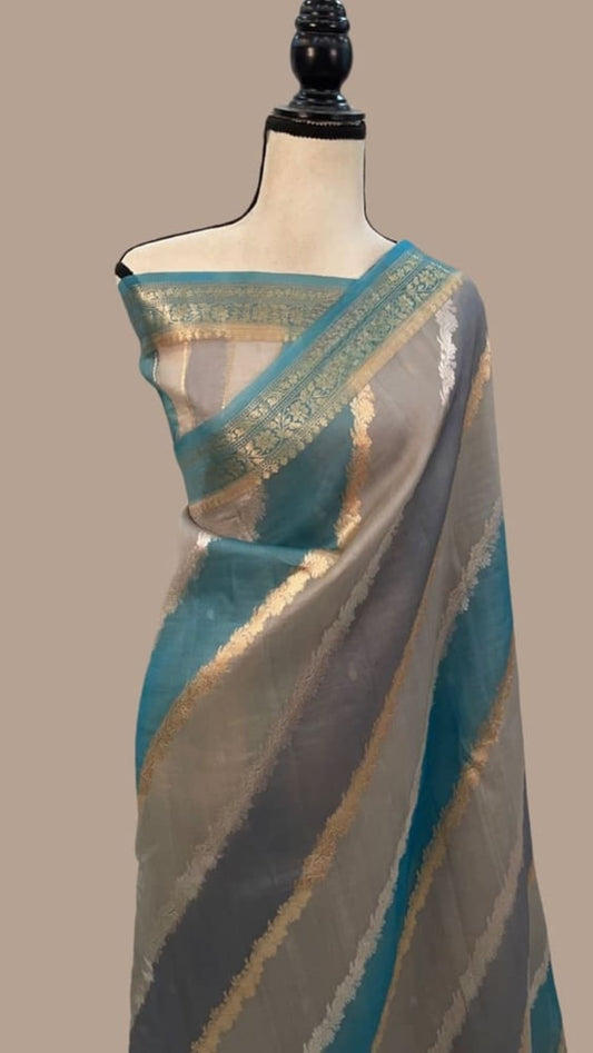 Turquoise & grey Banarasi saree with gold diagonal stripes, pallu border