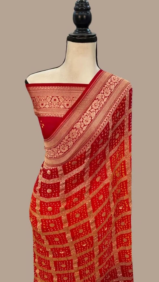 Red sari with gold lattice pattern and beige-gold pallu border