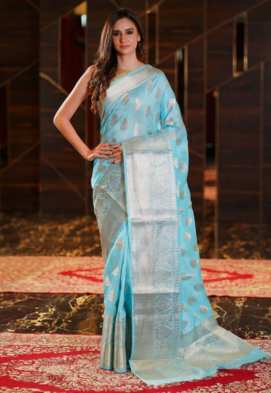 Aqua blue pure linen Banarasi saree featuring gold motifs and satin-sheen zari border