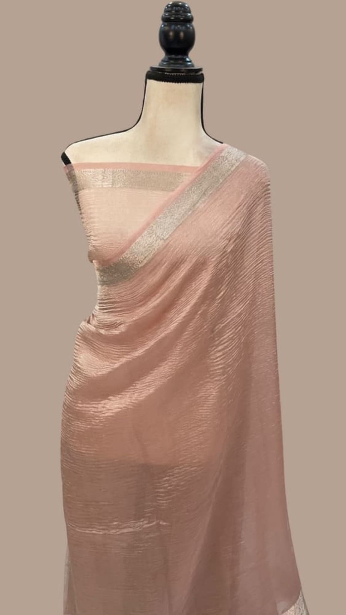 Baby pink tissue saree with silver zari border and pallu