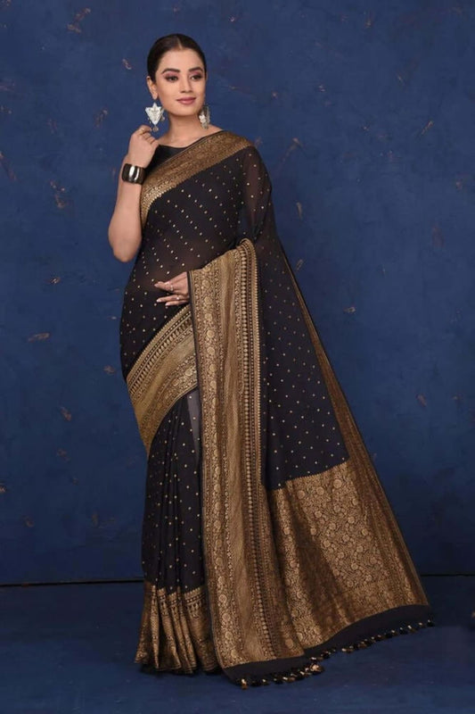 Black khaddi georgette saree with antique gold zari border and speckled dot details