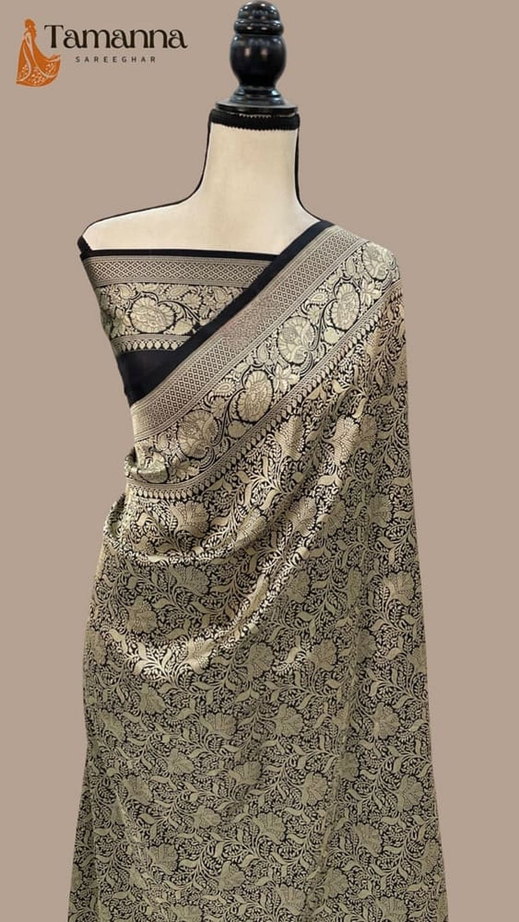 Black Banarasi silk saree with gold ornamental border and diagonal band