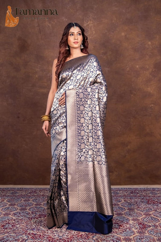 Navy-blue banarasi silk saree with wide brocade border and pallu drape