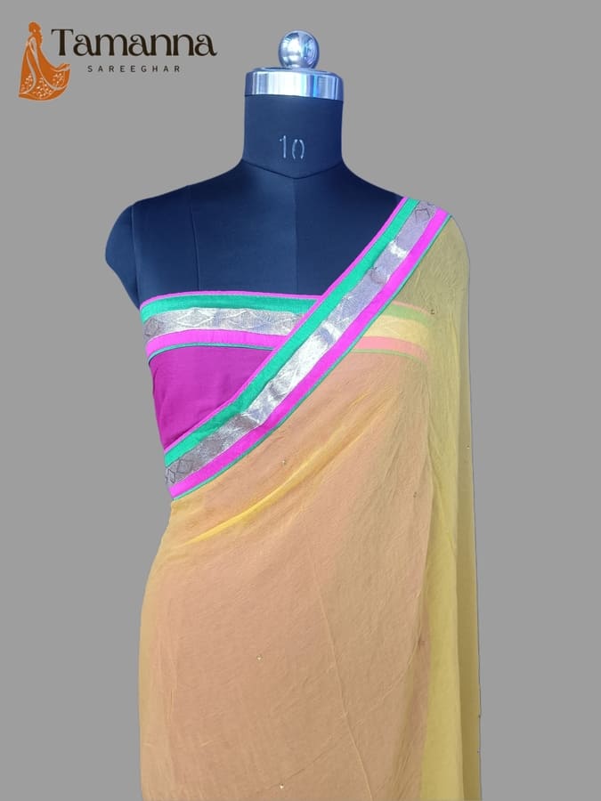 Cream chiffon saree with multicolor striped palla border, shown on a mannequin.