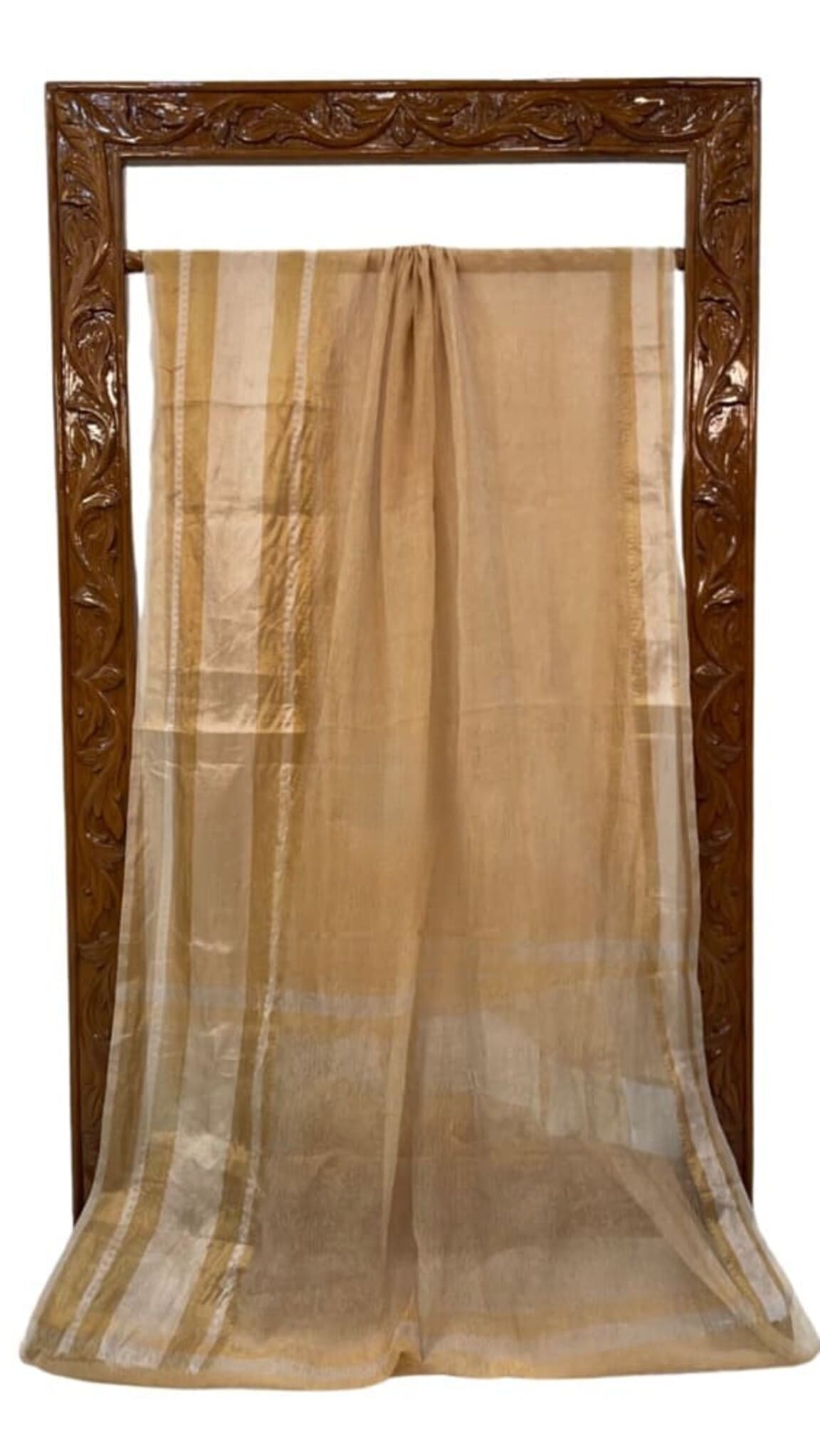 Cream tissue saree with gold border, neatly hung with transparent drape