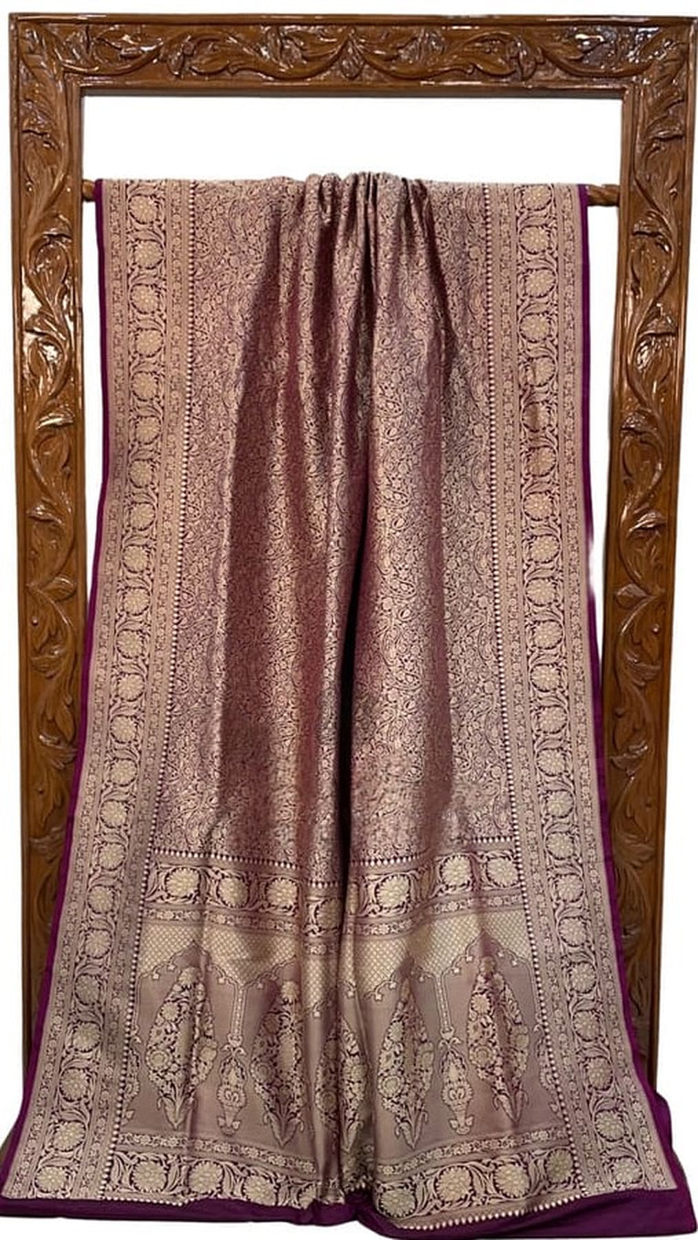 Deep purple silk Banarasi saree with gold woven bands, pleated center and ornate border