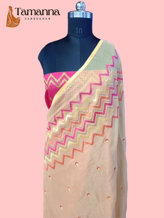 Ivory chiffon saree with zigzag resham border in pink and yellow, small scattered motifs