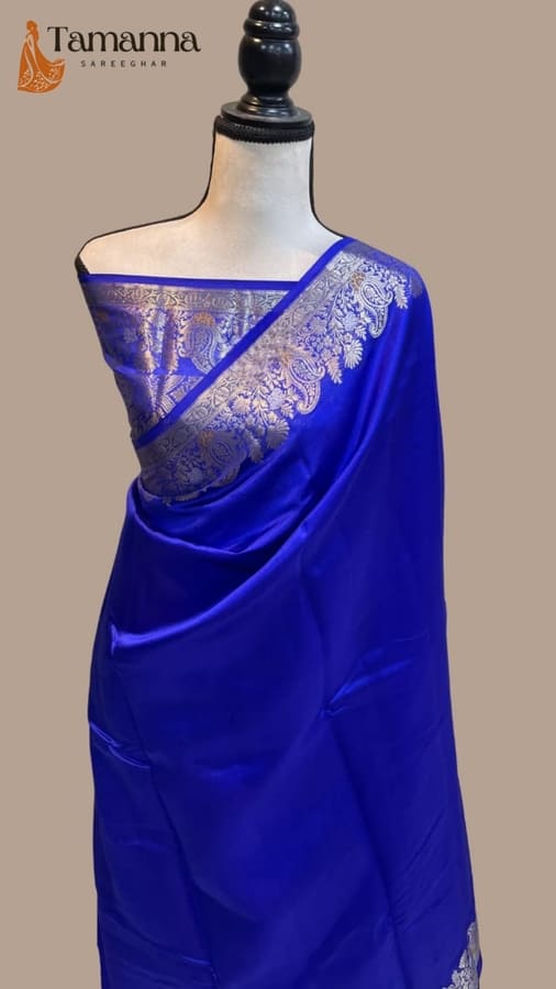 Royal blue silk Banarasi saree with ornate silver border and pallu