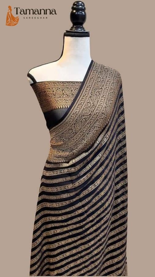 Warm silk Banarasi saree in dark black with gold border and patterned pallu