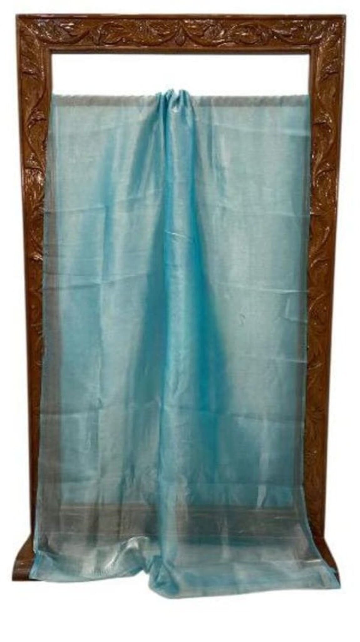 Teal Banarasi saree laid out flat, gathered top and darker border at hem