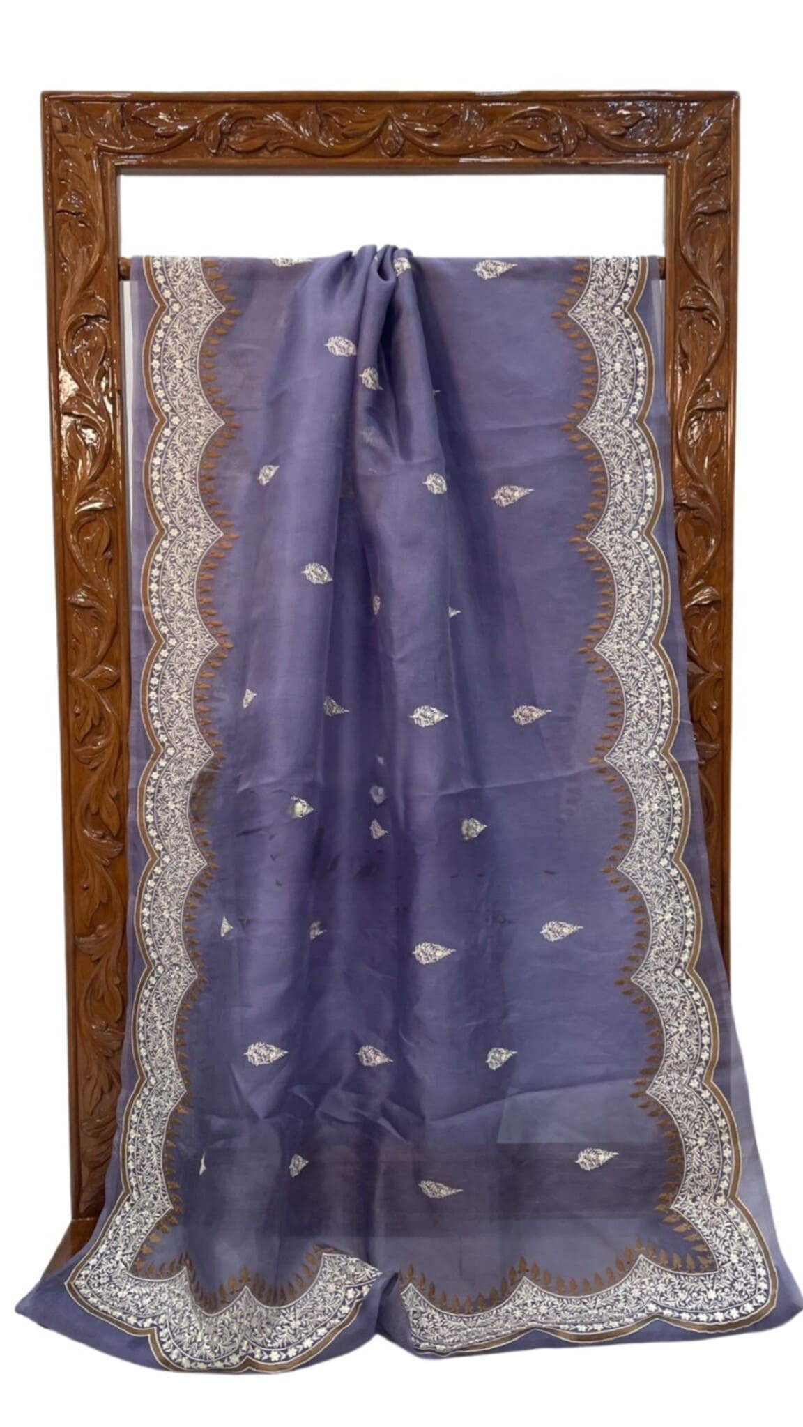 Dark blue saree with gold motifs and silver-gold scalloped border