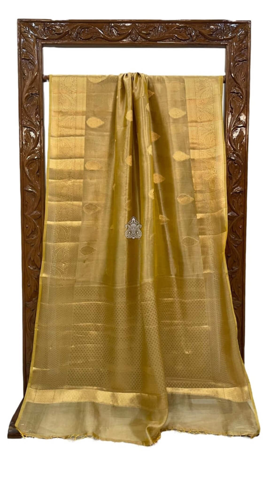 Golden yellow Banarasi tissue saree with border stripe, textured weave, and center medallion