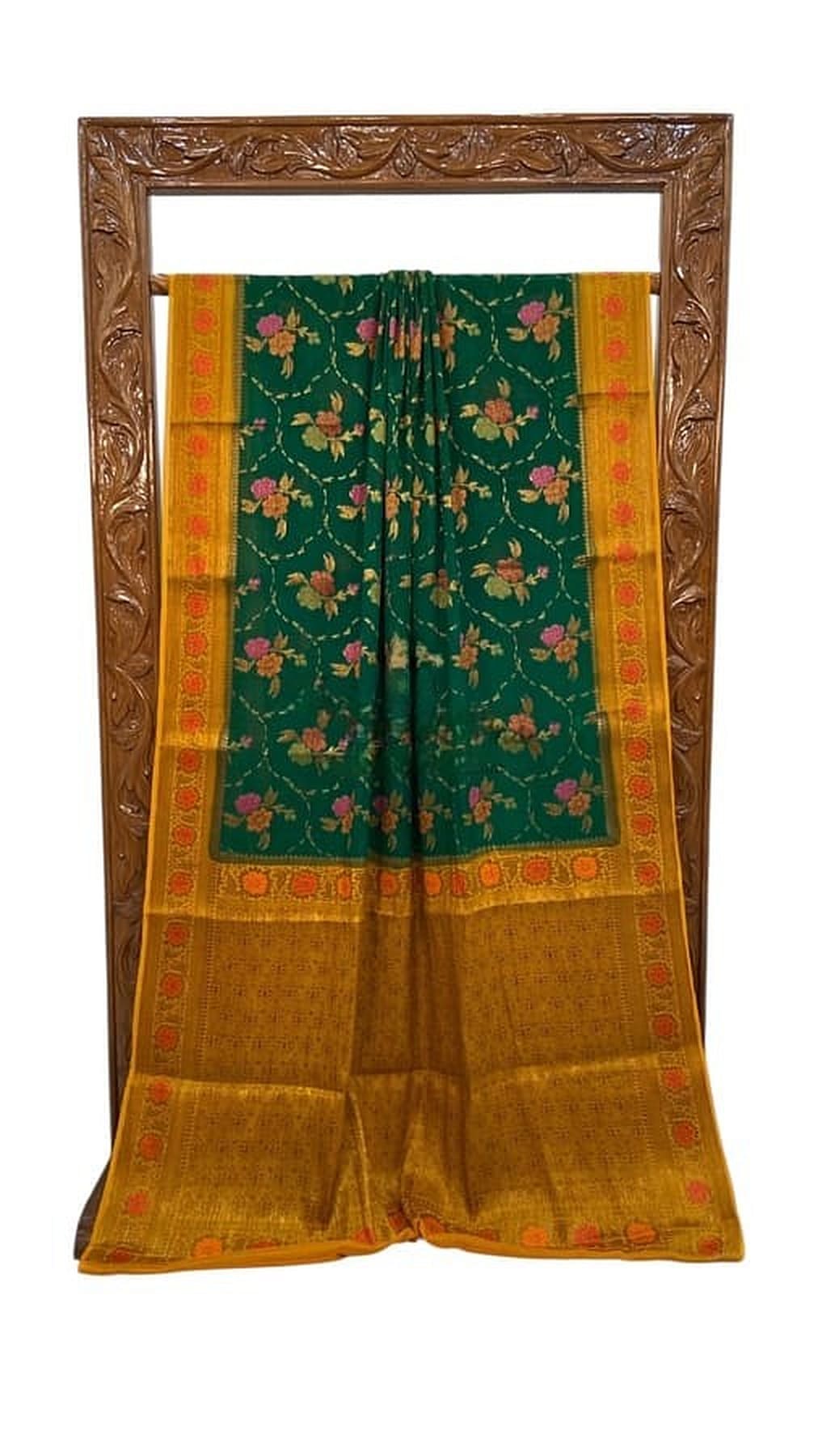 Dark green saree front view, mustard-gold border, red-orange floral motifs and decorative panel