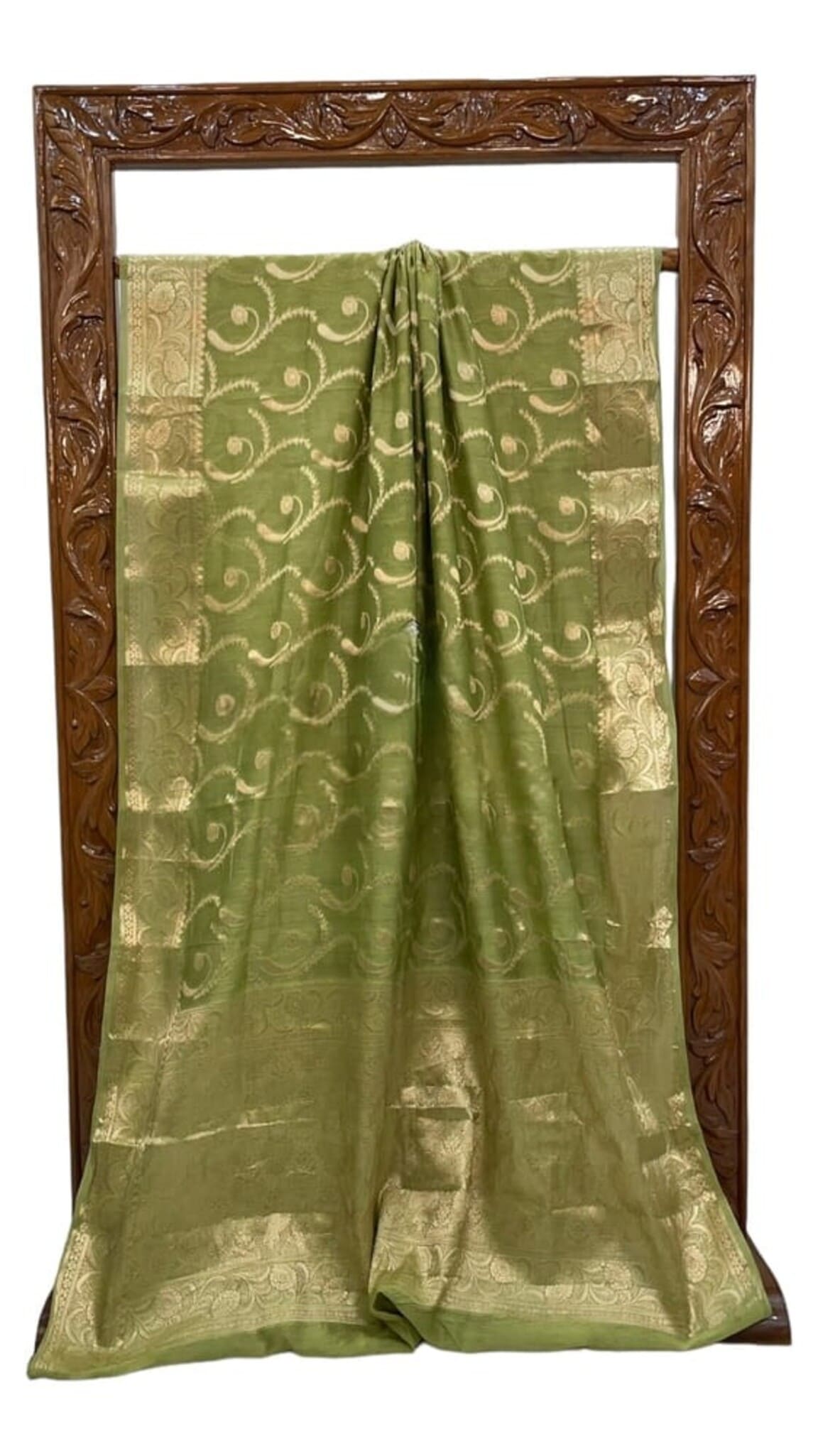 Green handloom Banarasi saree folded, pure cotton with ornate gold damask pattern