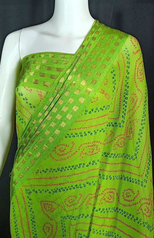 Green georgette saree featuring dotted checks, zari border and patterned pallu fold