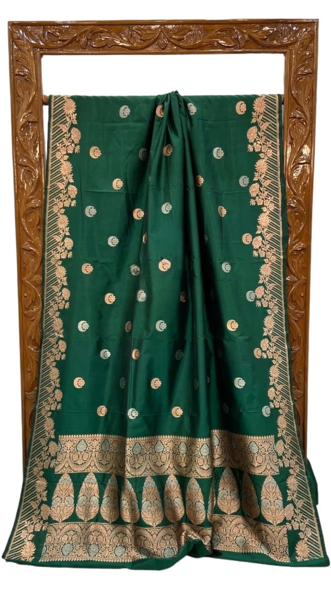 Green silk saree folded view, scattered motifs with detailed gold hem border