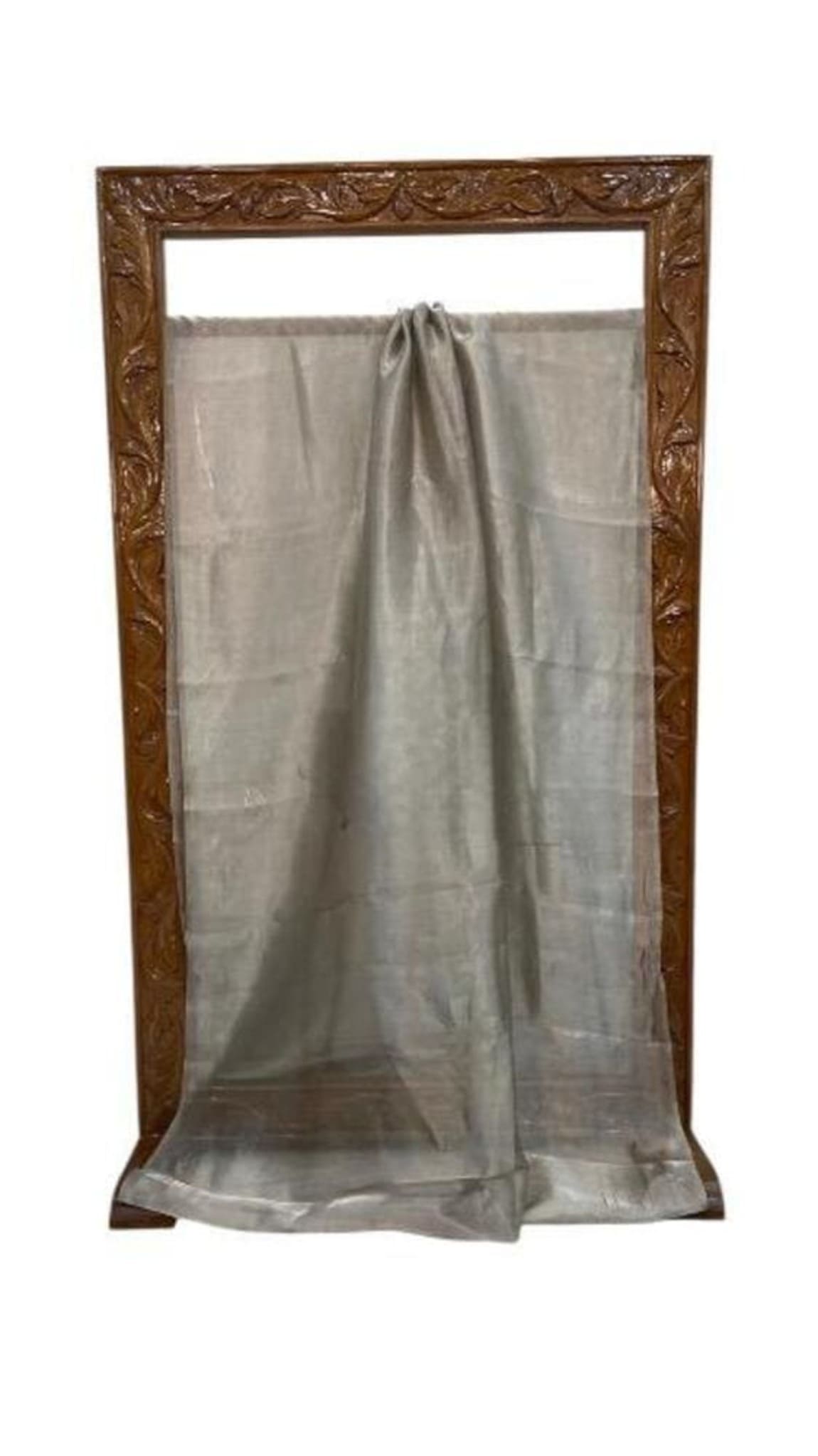 Grey plain handloom Banarasi saree laid flat in frame, gathered at top