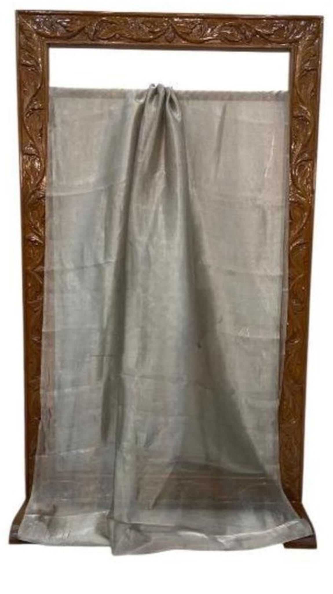 Grey plain handloom Banarasi saree laid flat, gathered at top edge