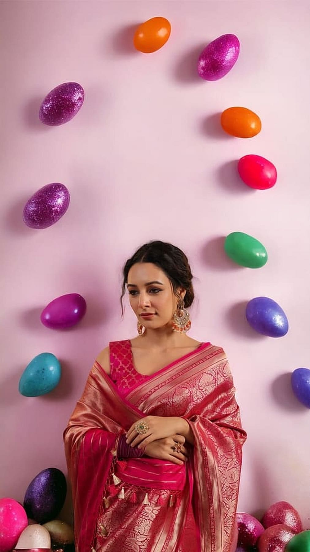 Hot pink Banarasi silk saree with gold border, upper body close-up