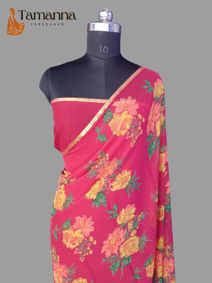Floral chiffon saree with gold-edged border, hot pink and teal drape with pallu