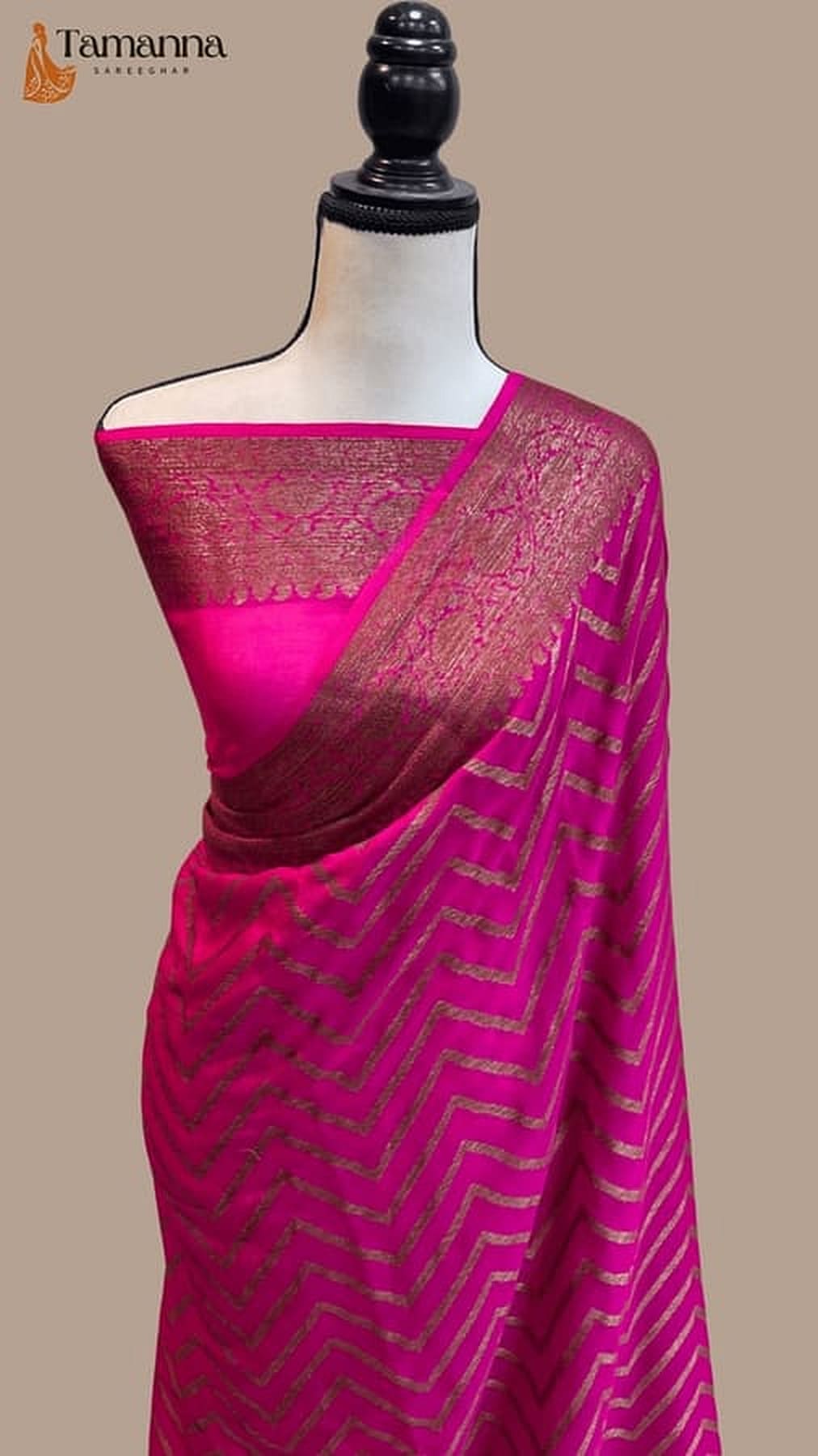 Hot pink Banarasi chiffon saree with gold zari border and textured pallu drape