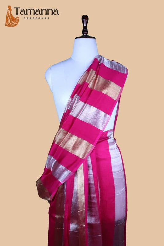 Hot pink saree with silver zari striped pallu and magenta border