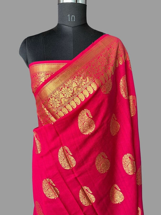 Hot pink silk saree with wide gold zari pallu border and scattered gold motifs