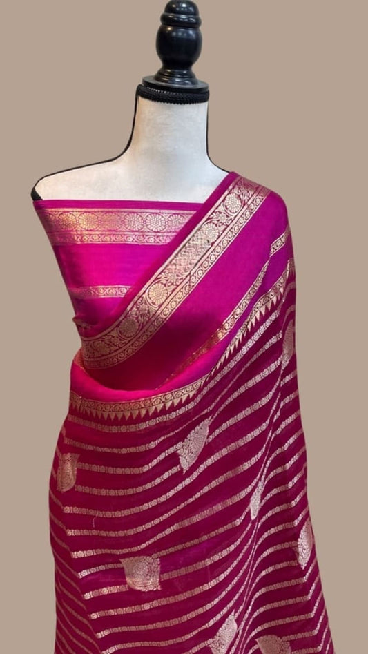 Hot pink Banarasi saree with gold zari woven stripes and ornate border