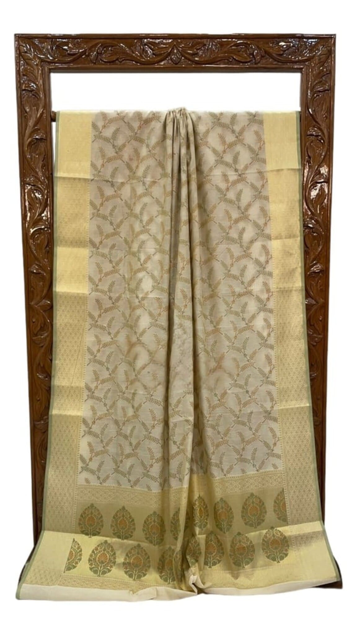 Ivory cotton handloom Banarasi saree folded with patterned body and decorative border panel