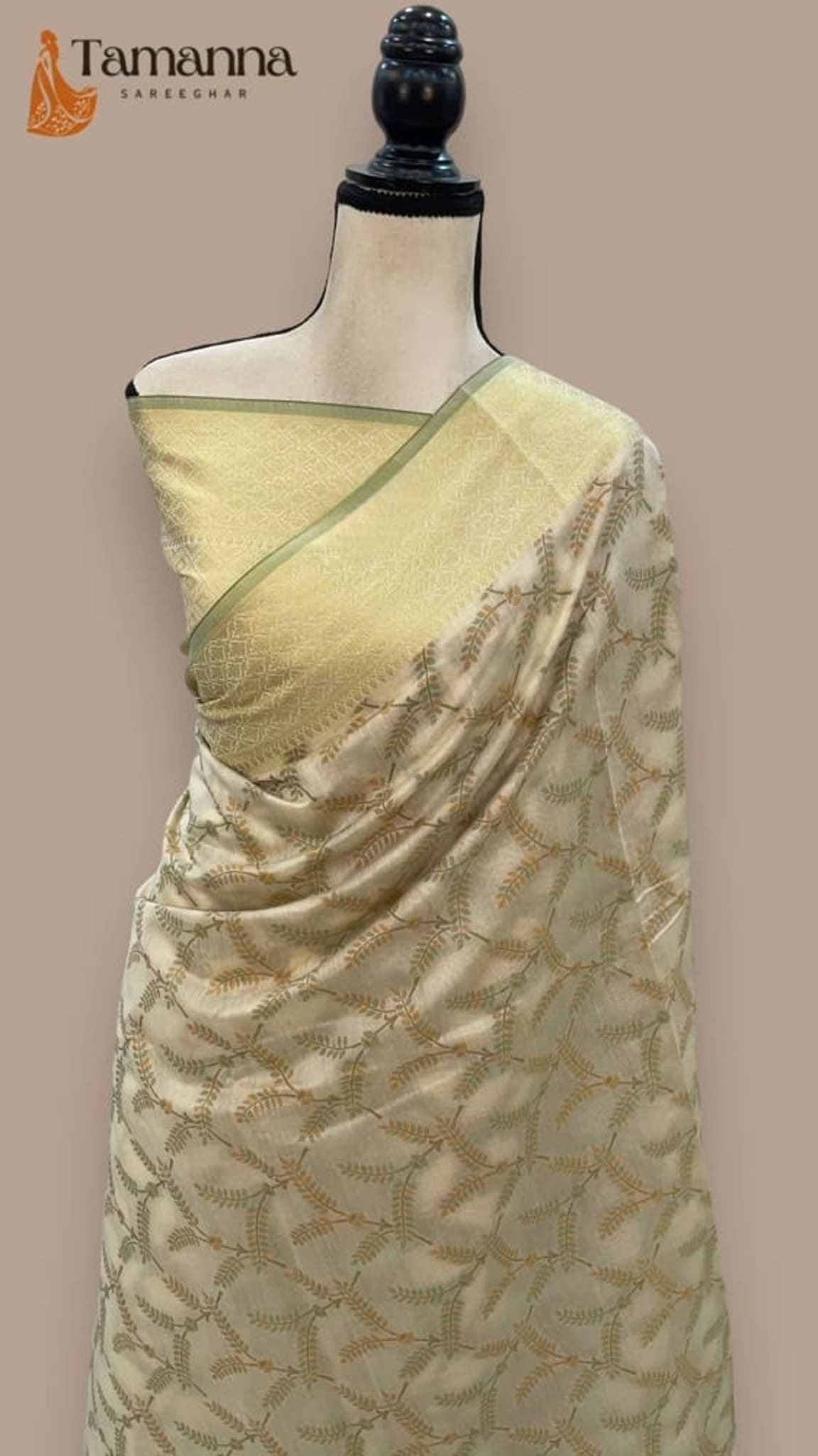 Ivory cotton handloom Banarasi saree with subtle woven pattern and pale border drape