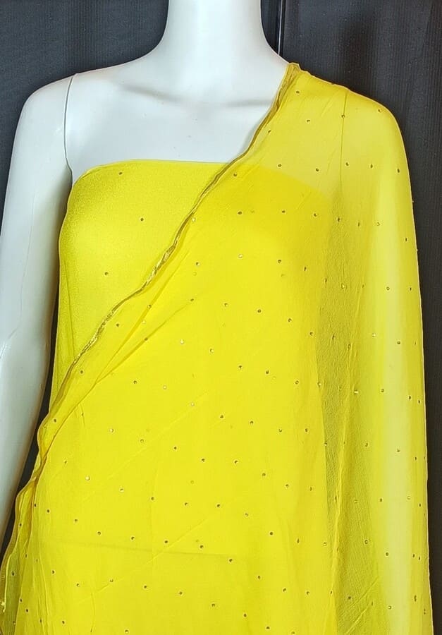 Lemon yellow chiffon saree pallu with scattered mirror and stone embellishments