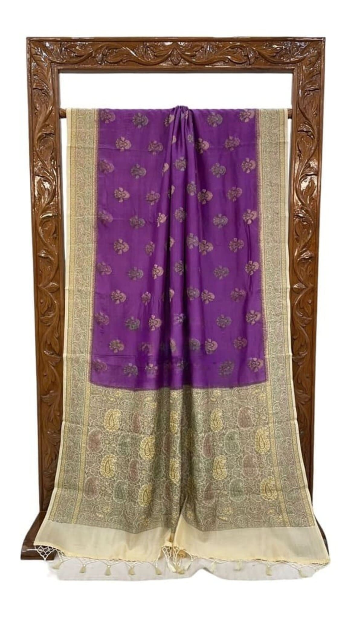 Purple saree drape with gold buti motifs, wide zari border and light tassels