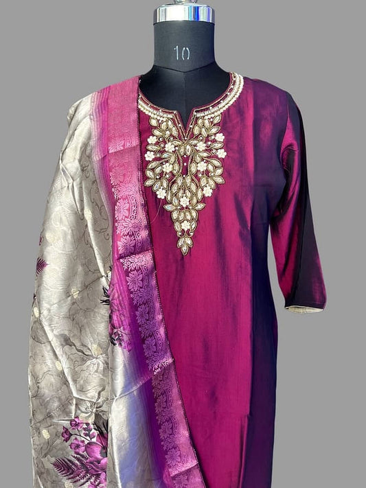 Magenta silk kurta with gold embroidered neckline and layered dupatta panel