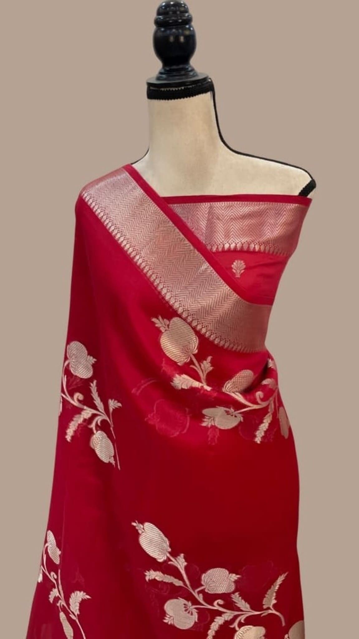 Magenta saree with silver-gold kora border and off-white floral butta on drape