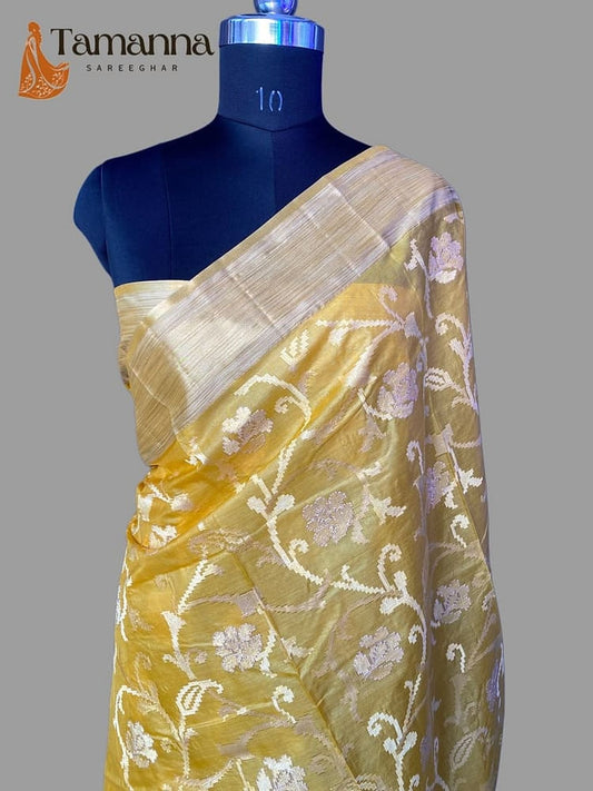 Mango yellow pure silk saree with white resham motifs and silver-gold border