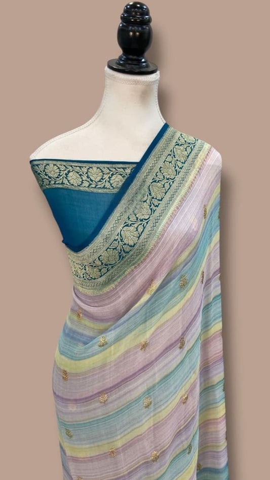 Turquoise border handloom saree with lilac, blue and green pastel stripes