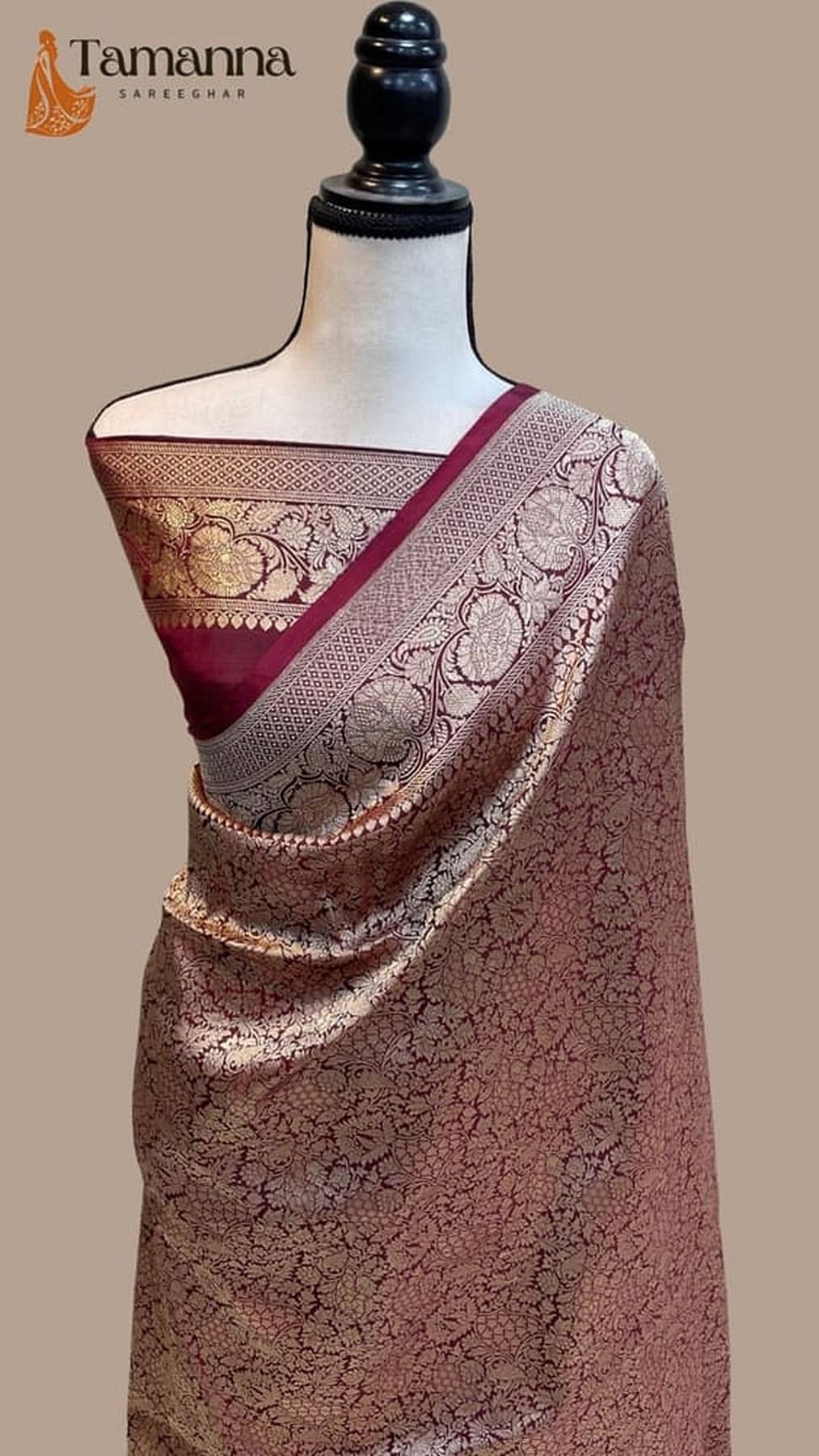 Banarasi silk saree draped on mannequin, mauve with maroon pallu and ornate border
