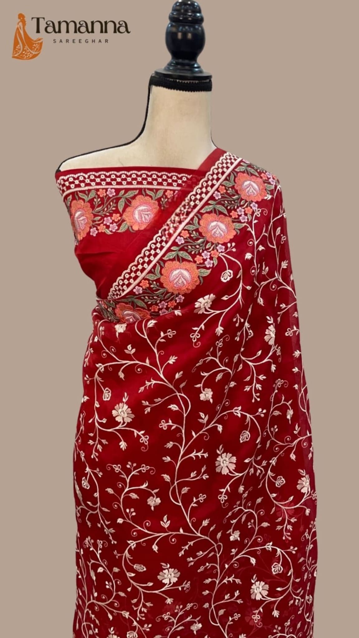 Maroon draped saree with floral jaal motifs and contrast trim on pallu