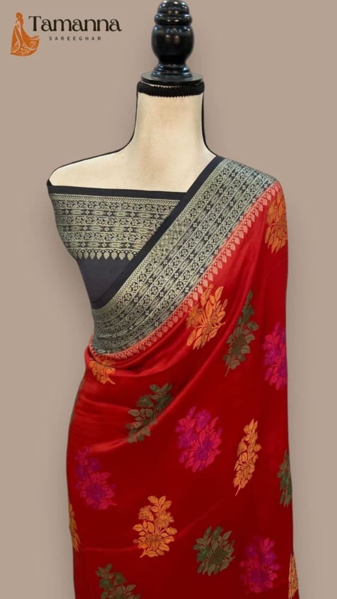 Maroon Banarasi saree with black border and golden floral weaving on mannequin