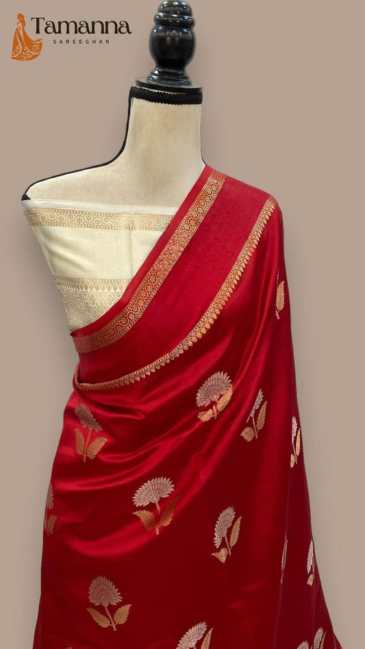 Maroon silk saree with cream blouse panel, gold border and leaf motifs