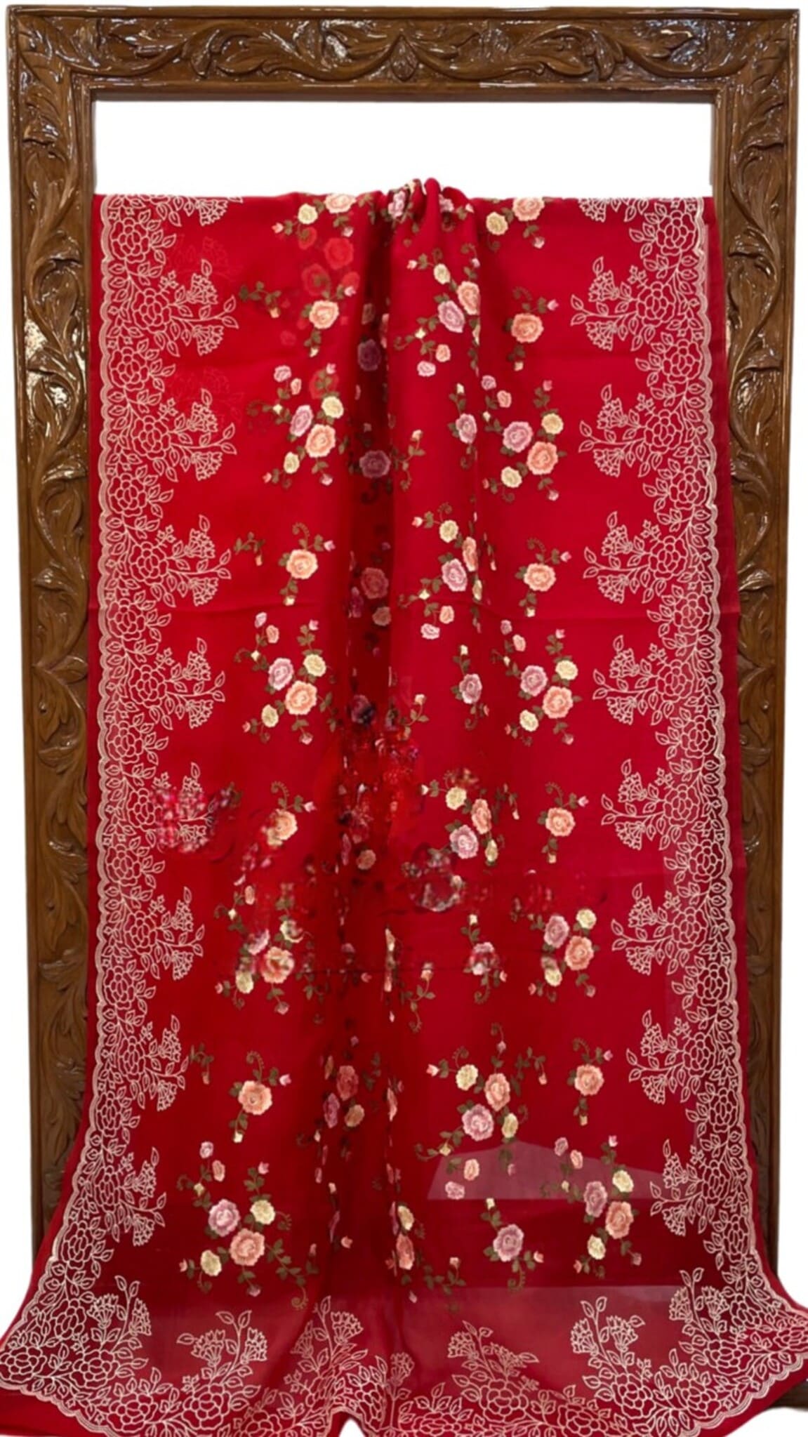 Maroon organza saree with intricate gold floral work and wide lace edging