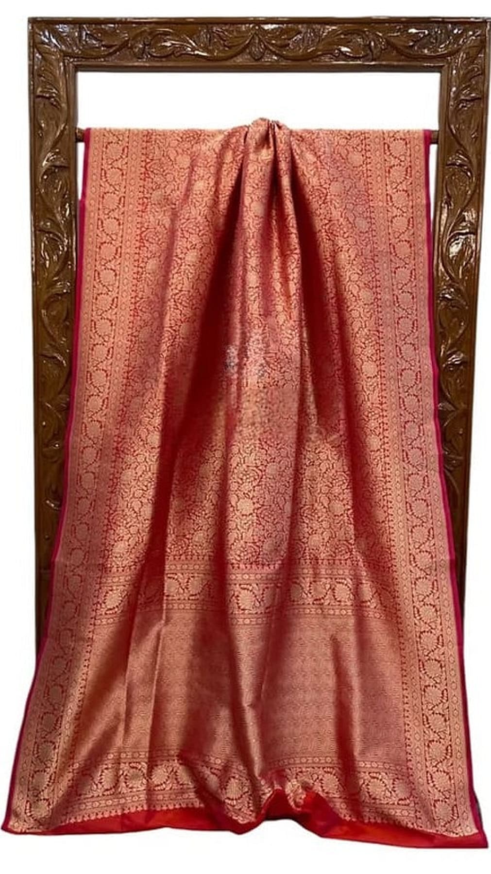Rust metallic silk saree with all-over zari motifs and gathered pleats, border edge