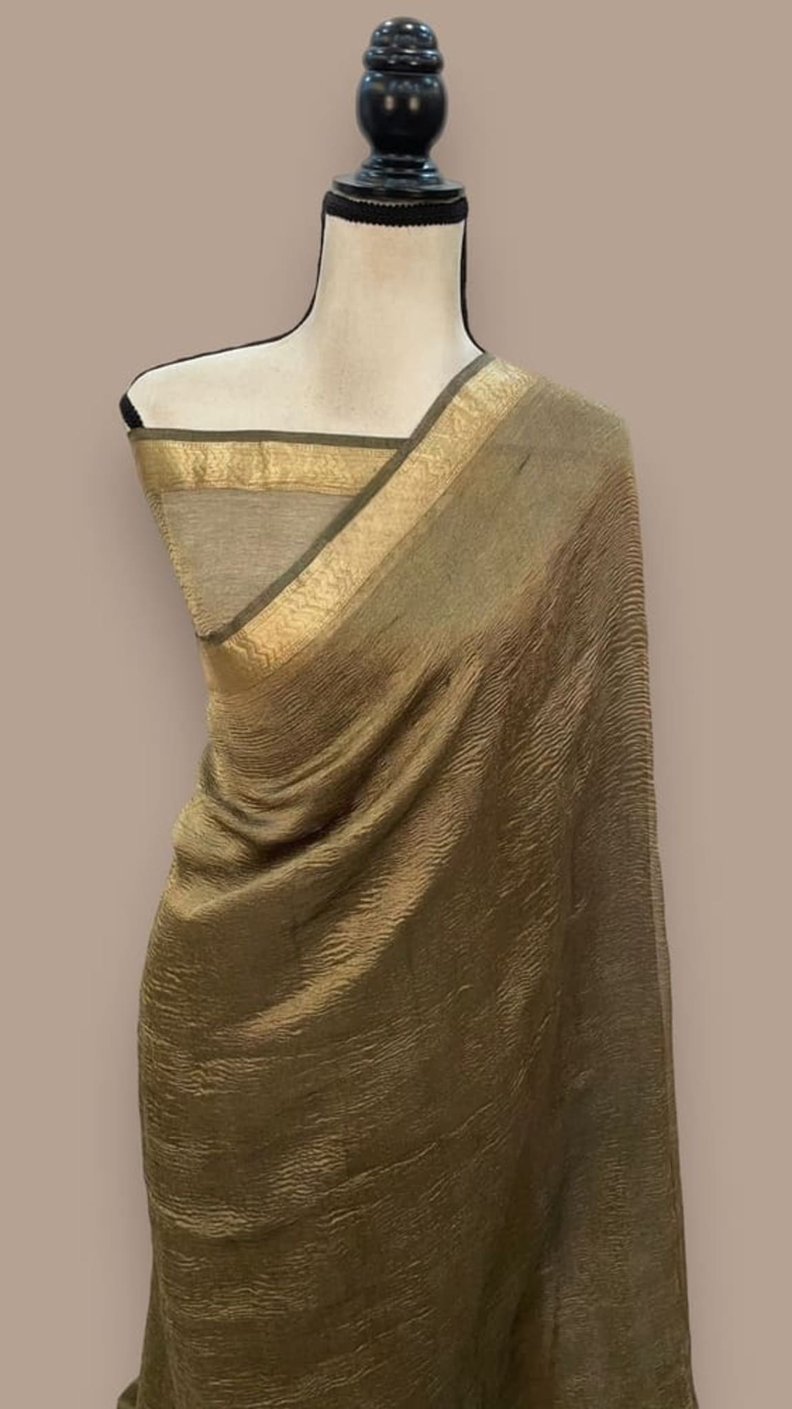 Olive and gold Benarasi-style tissue saree with wide gold border and woven motifs